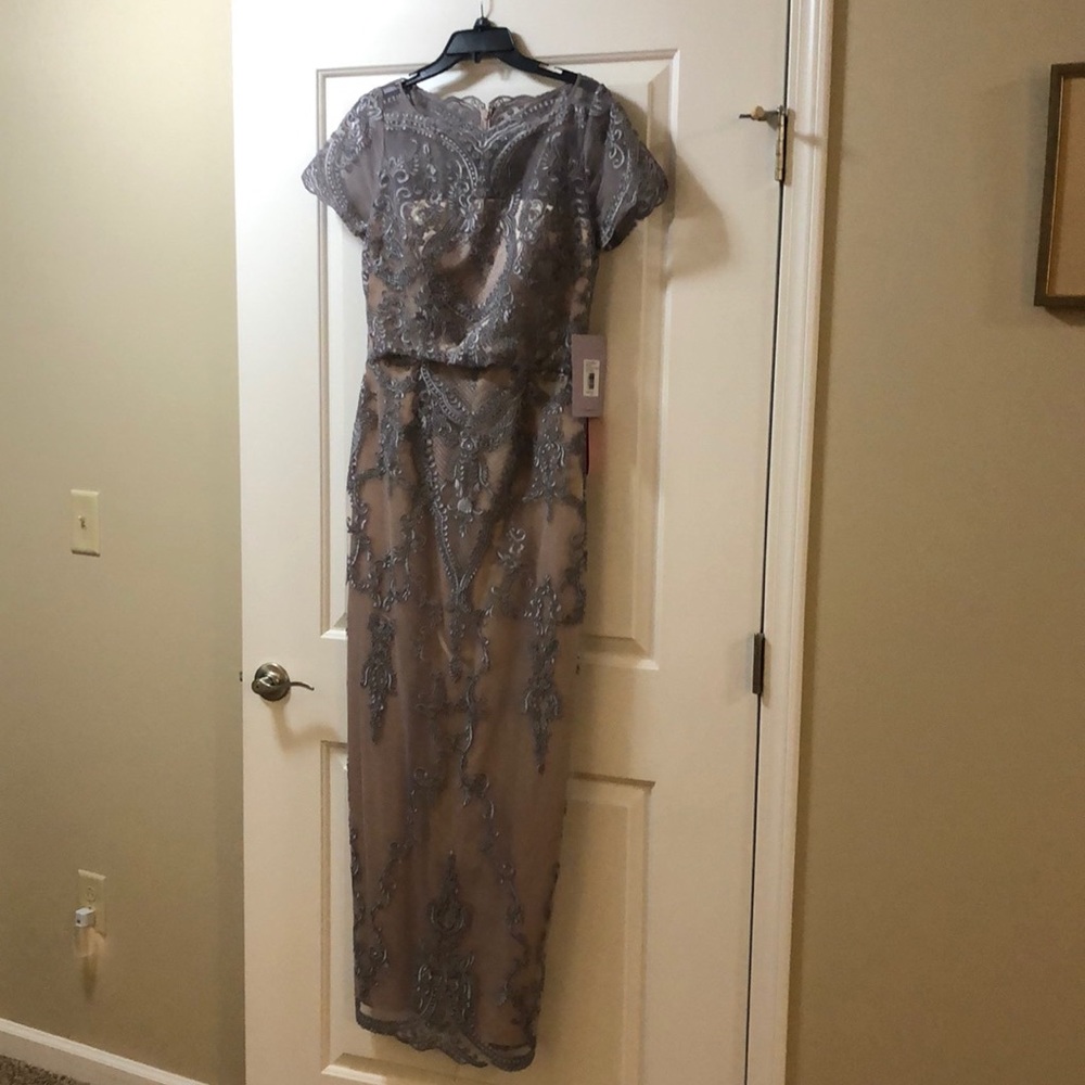 Scalloped embroidered blouson gown bateau neck.